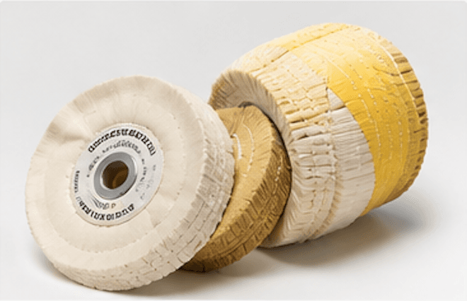 Airway buffing wheels in white, tan, and yellow cloth with metal hubs