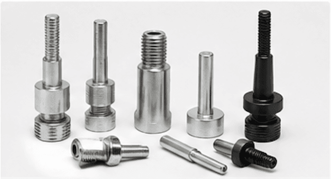 Assorted metal adapters and arbors for mounting abrasive wheels and discs