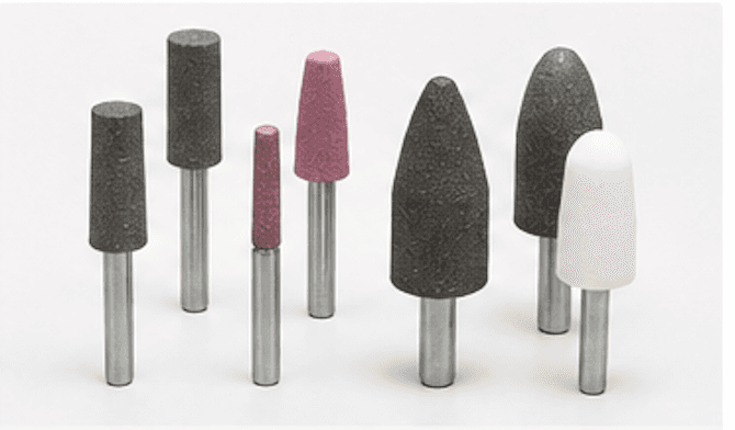 Assorted mounted abrasive points in cylinder and bullet shapes on metal shanks
